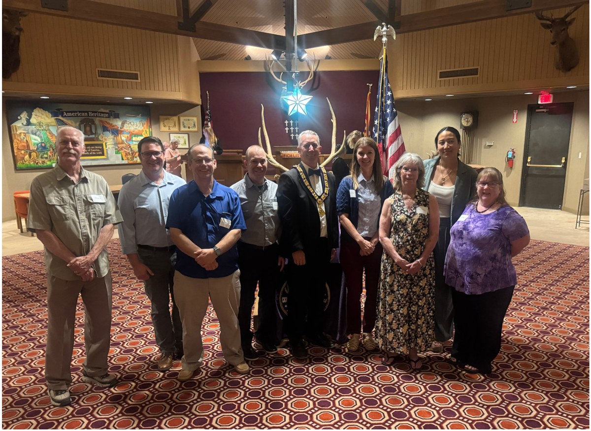 Second group of new members with Exalted Ruler Clint Tompkins